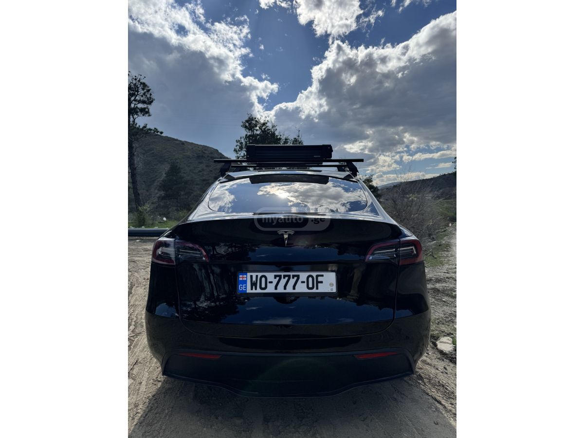 Tesla Model Y - фото 7