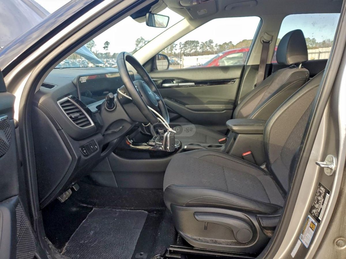 Kia Seltos - фото 7