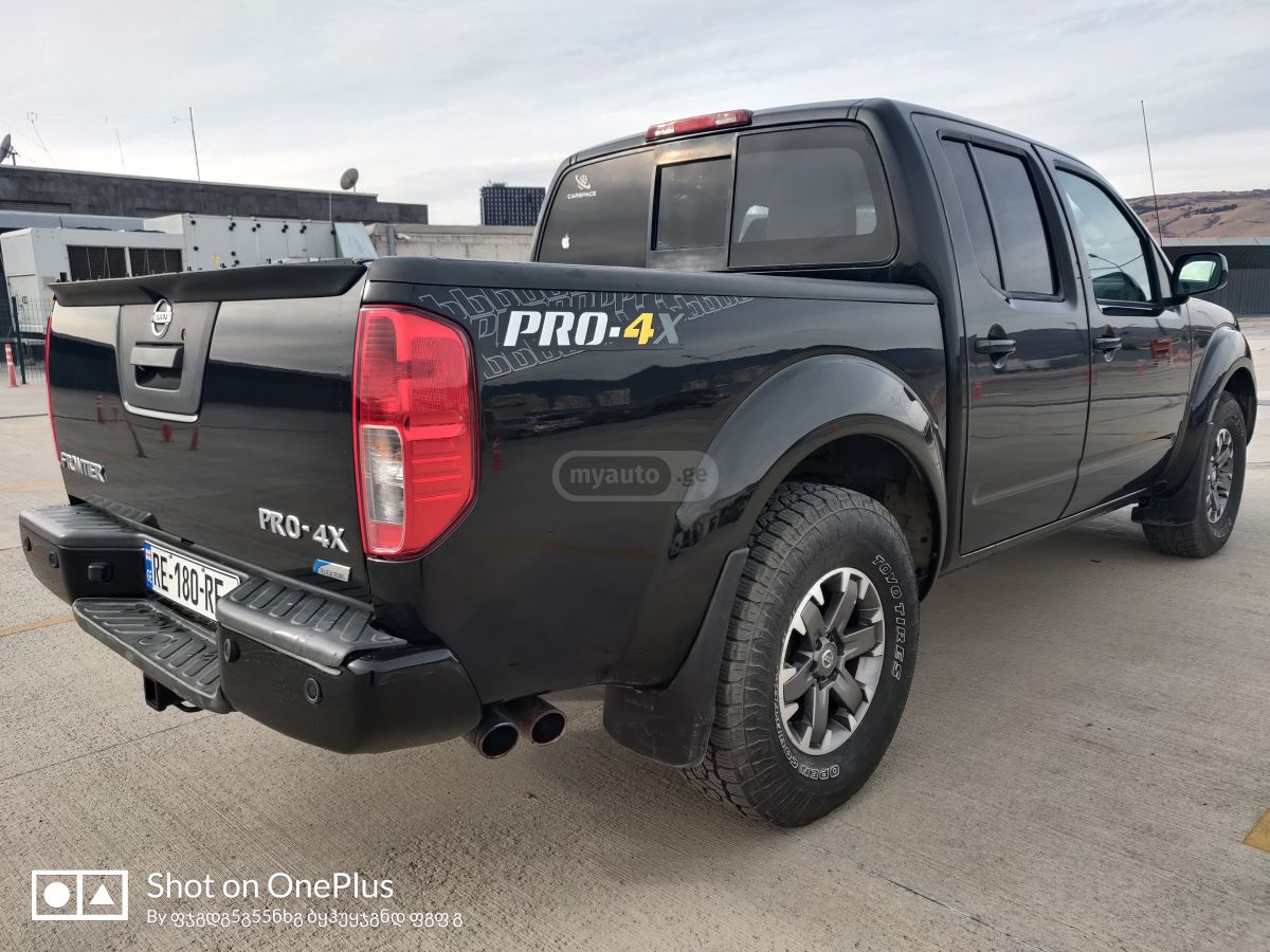 Nissan Frontier - фото 1
