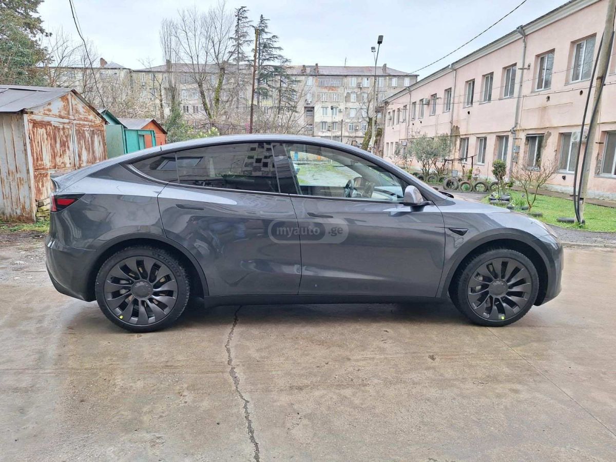 Tesla Model Y 2024 — фото 4 купить в Москве