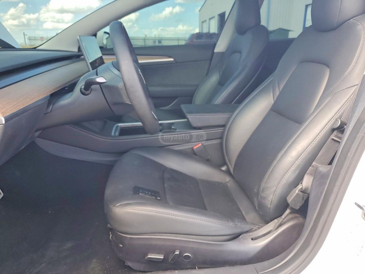 Tesla Model 3 - фото 4