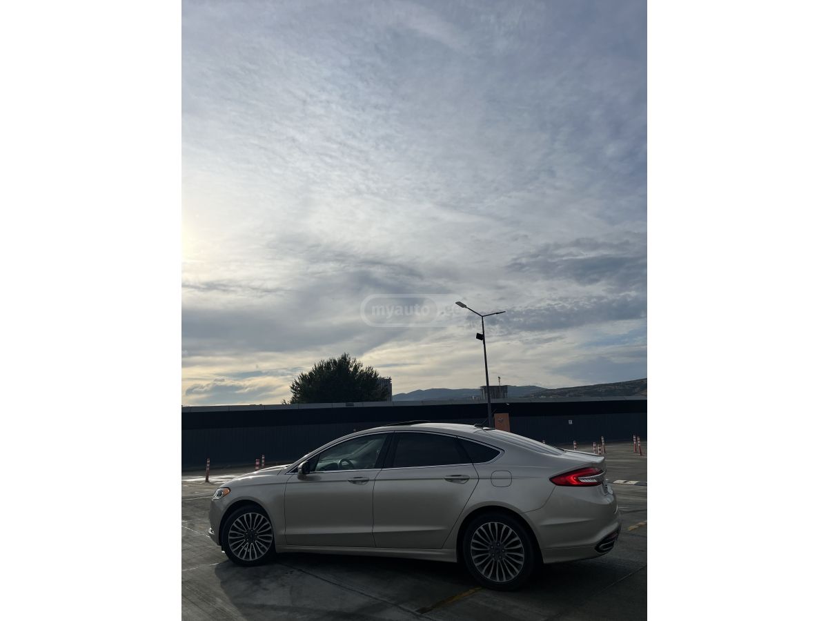 Ford Fusion - фото 11