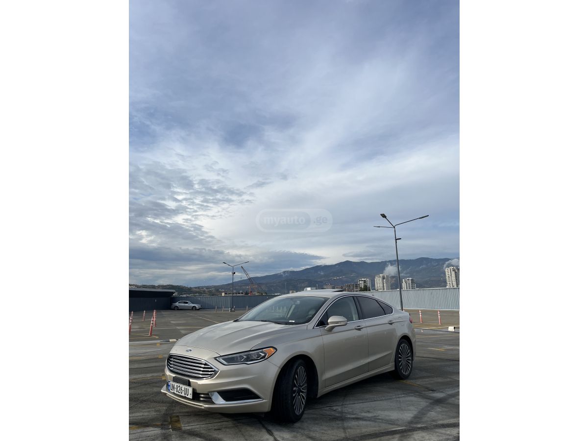 Ford Fusion - фото 12