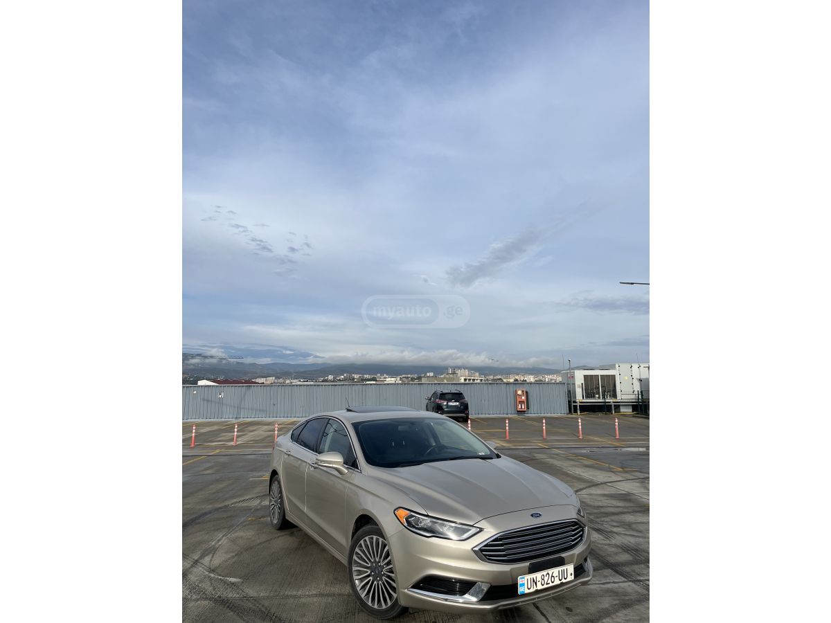 Ford Fusion - фото 7