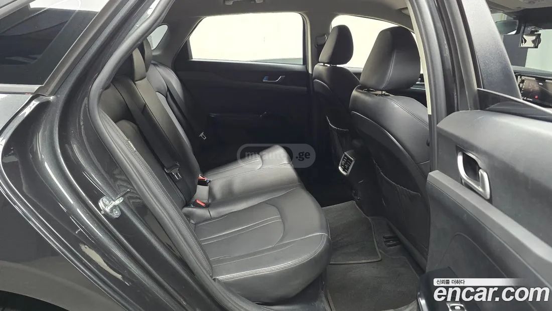 Kia Optima - фото 12