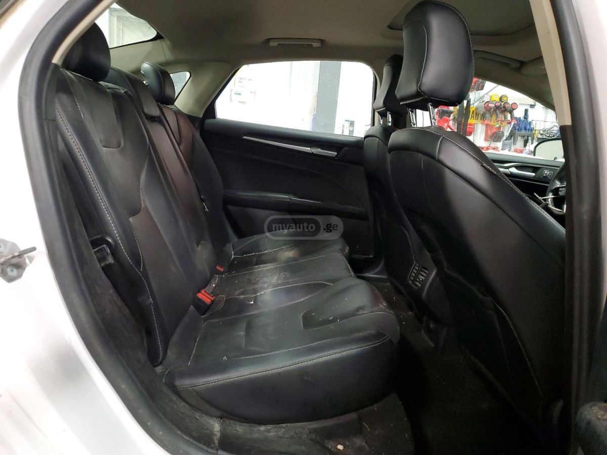 Ford Fusion - фото 10