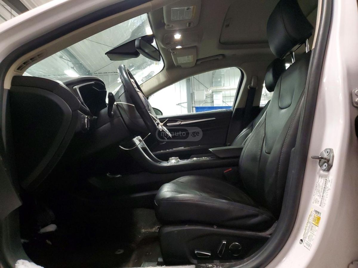 Ford Fusion - фото 7