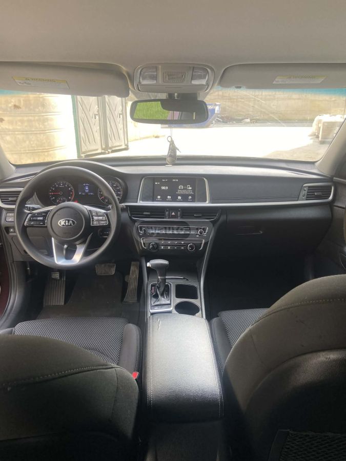 Kia Optima - фото 4