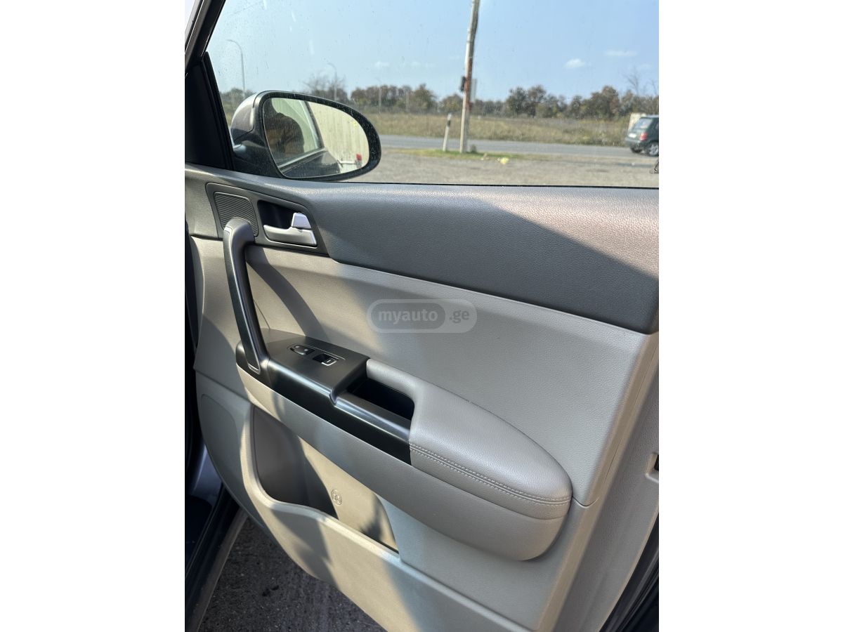 Kia Sportage - фото 12