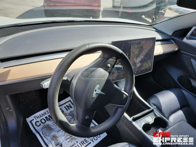 Tesla Model 3 - фото 13