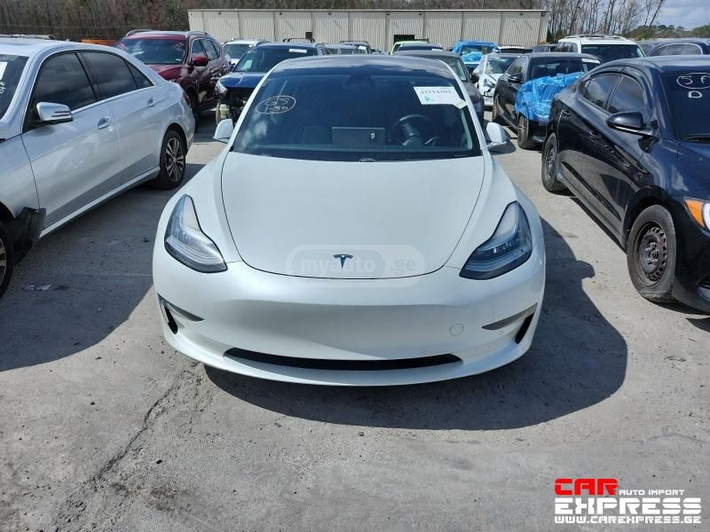 Tesla Model 3 - фото 6