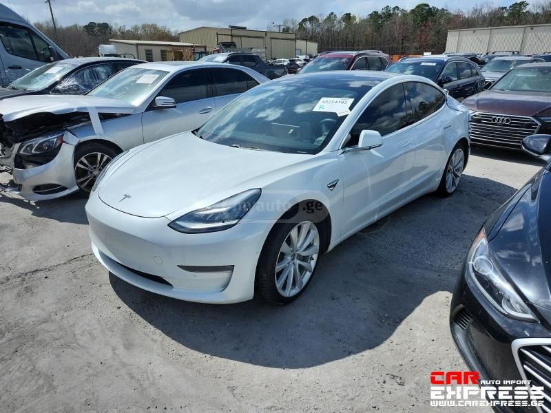 Tesla Model 3 - фото 7