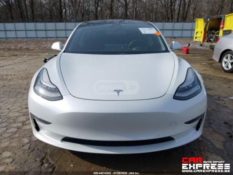 Tesla Model 3 - фото 8