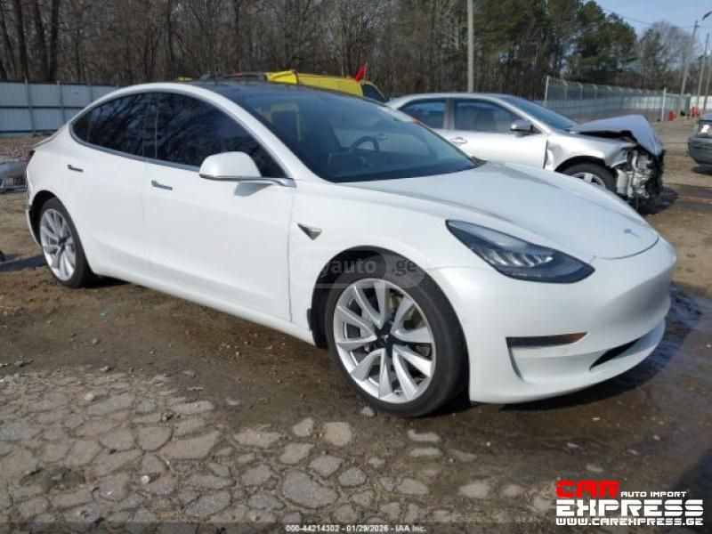 Tesla Model 3 - фото 9