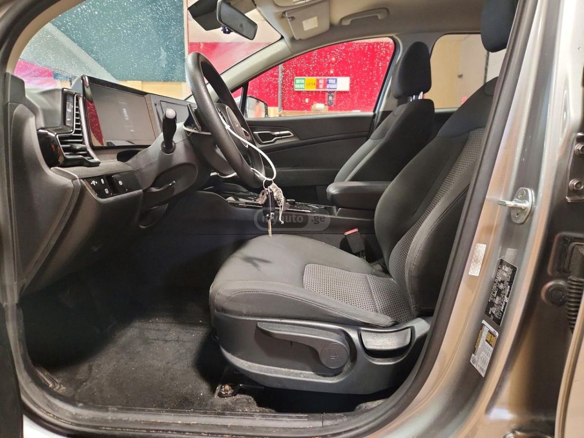 Kia Sportage - фото 7