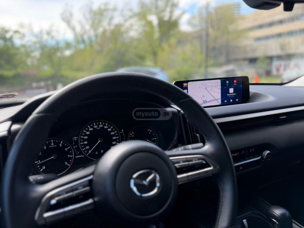 Mazda CX-50 - фото 12