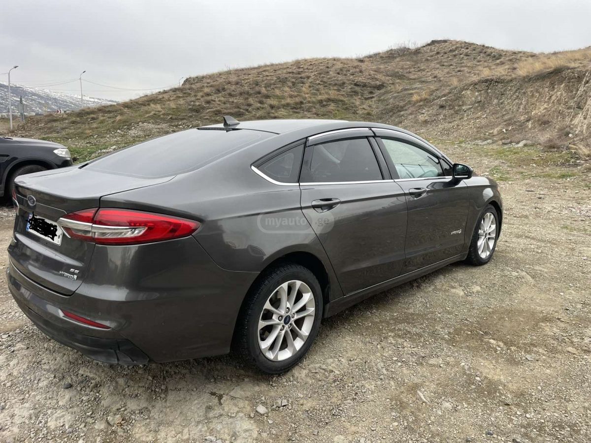 Ford Fusion - фото 10