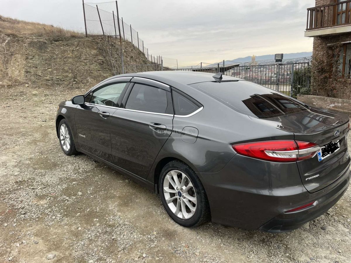 Ford Fusion - фото 11