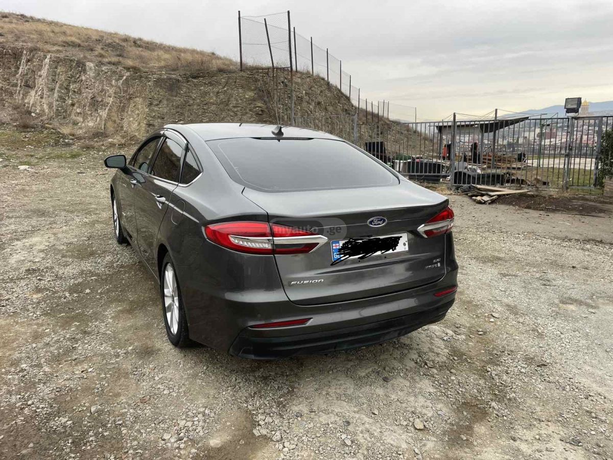 Ford Fusion - фото 9