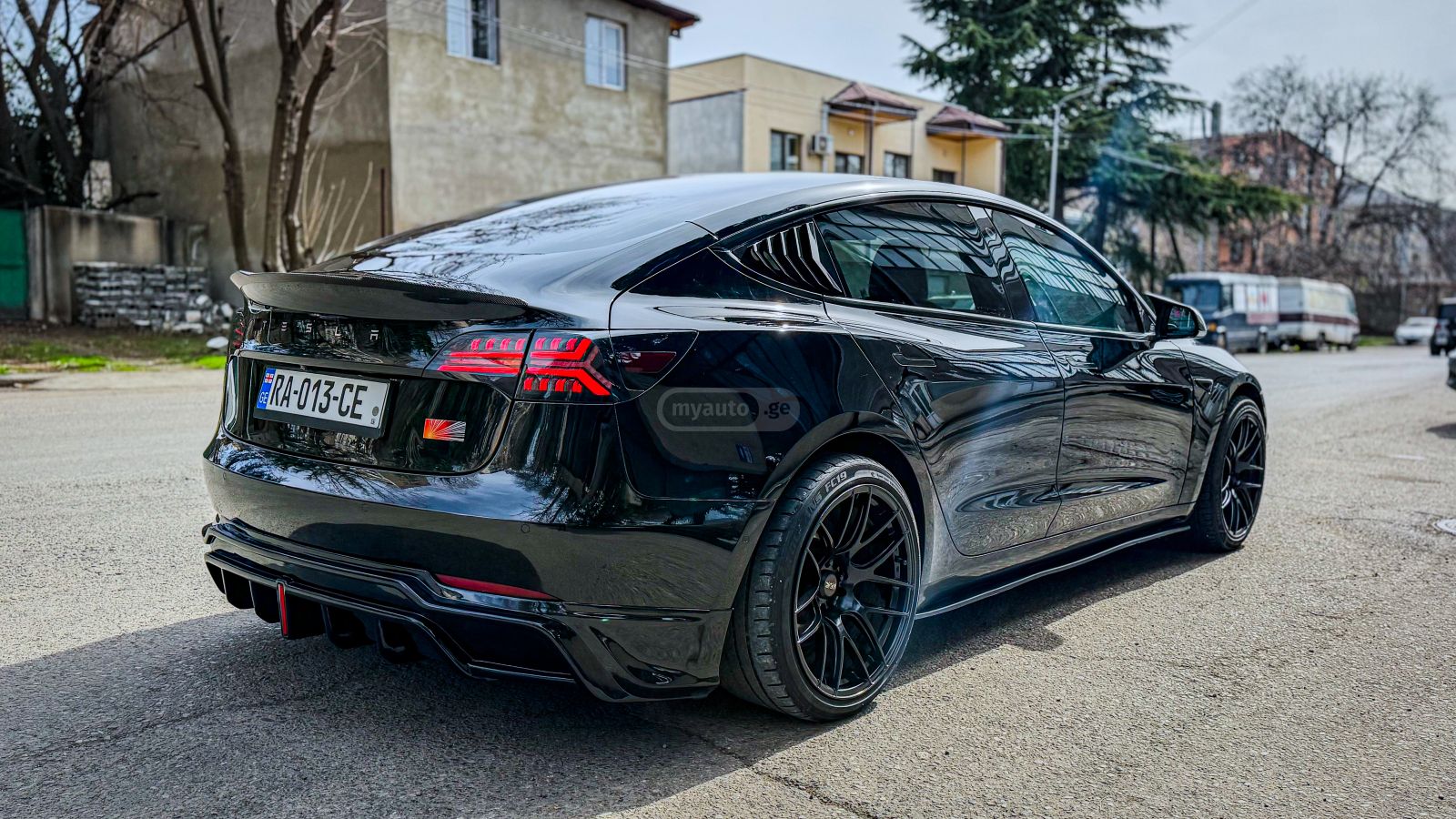 Tesla Model 3 - фото 12