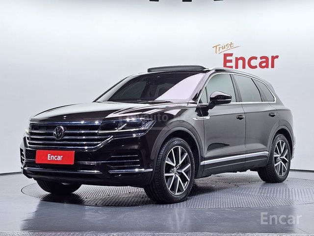 Volkswagen Touareg - фото 1