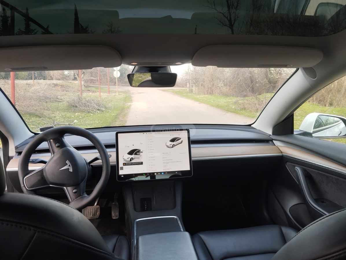 Tesla Model 3 - фото 11