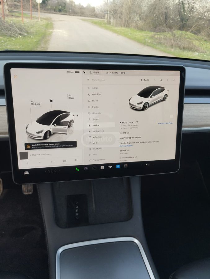 Tesla Model 3 - фото 12