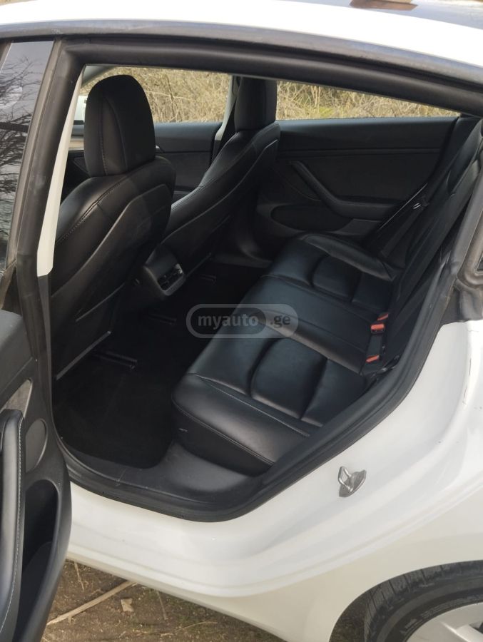 Tesla Model 3 - фото 9