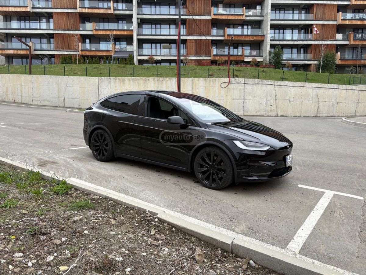 Tesla Model X - фото 9