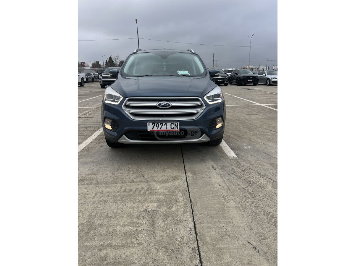 Ford Escape - фото 1