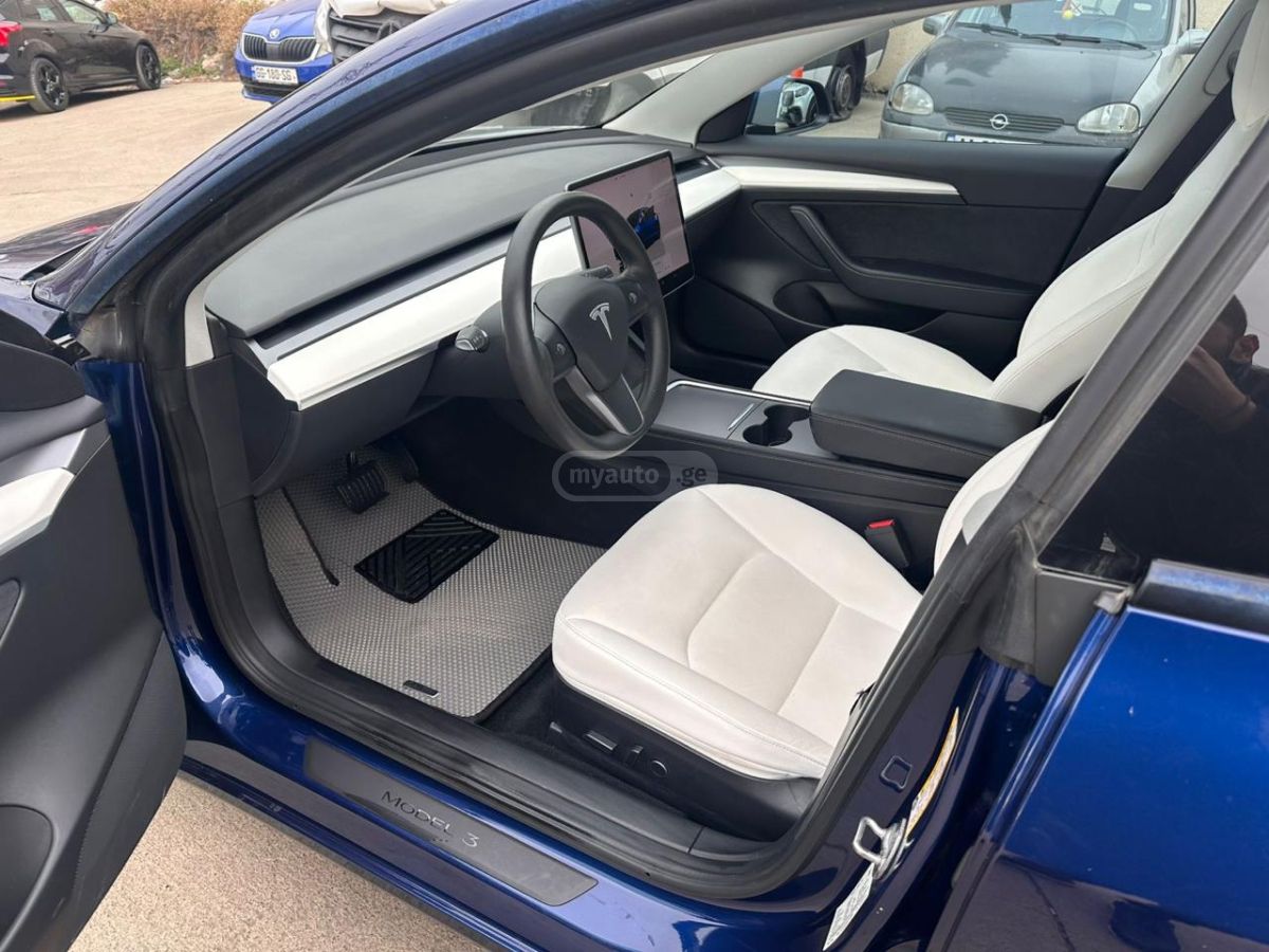 Tesla Model 3 - фото 10