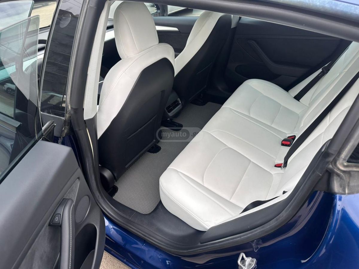 Tesla Model 3 - фото 9