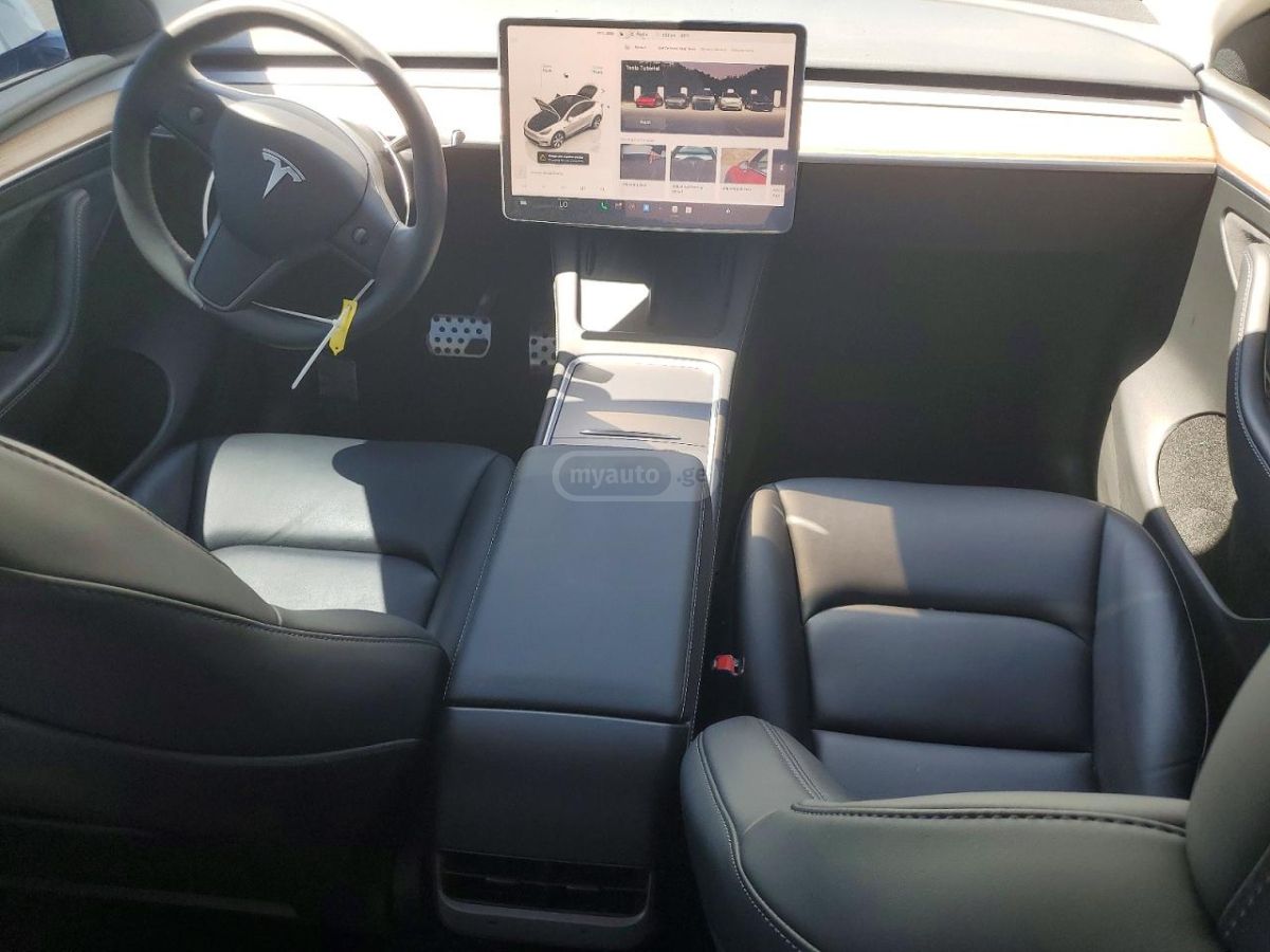 Tesla Model Y - фото 1