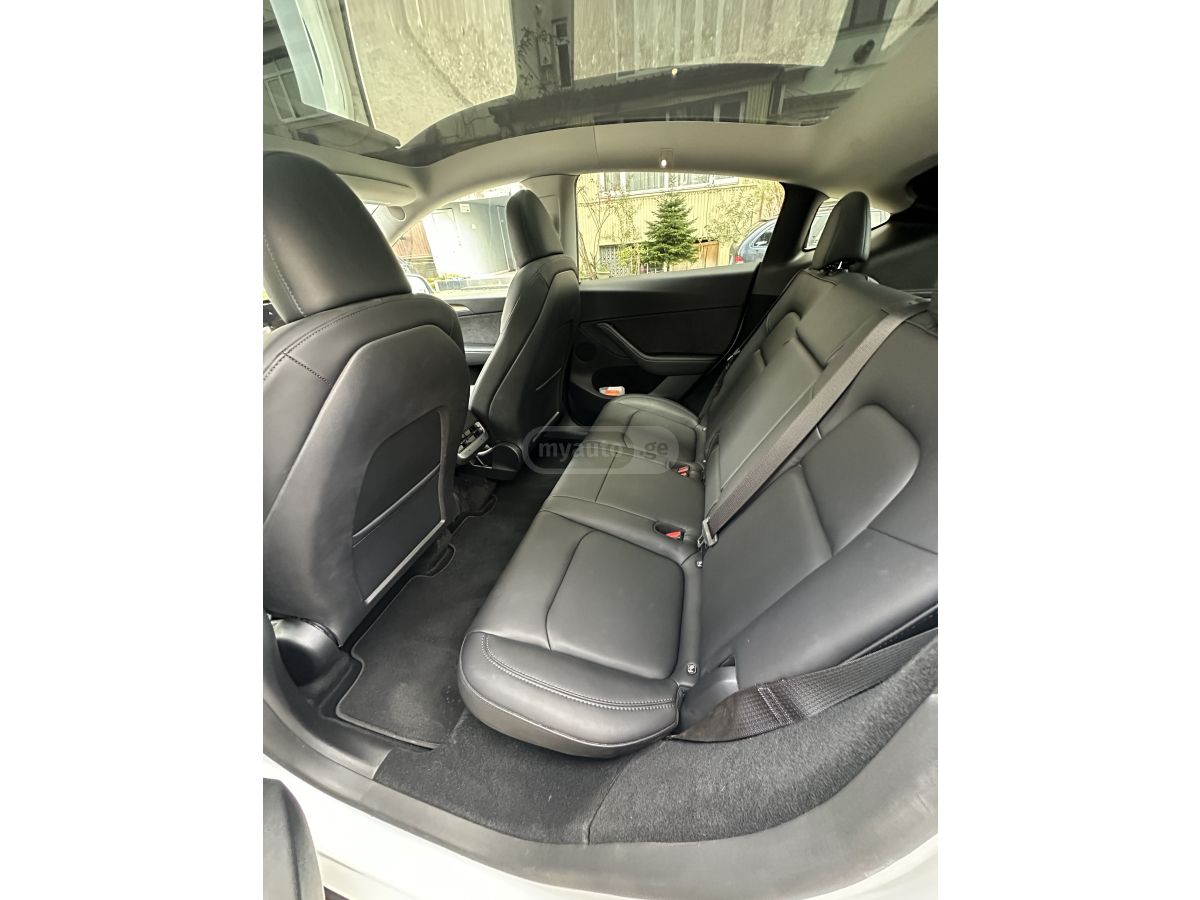 Tesla Model Y - фото 11