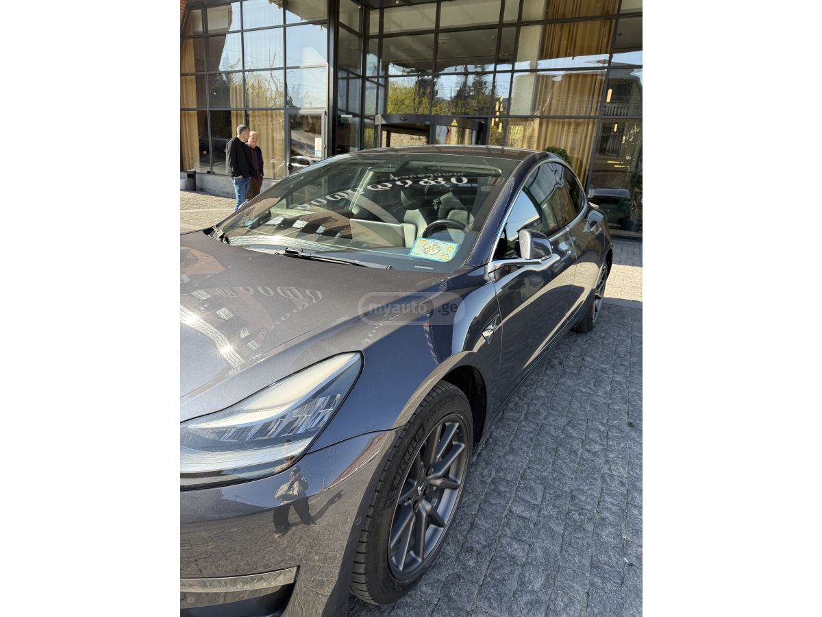 Tesla Model 3 - фото 11