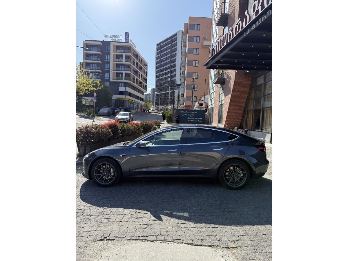 Tesla Model 3 - фото 5