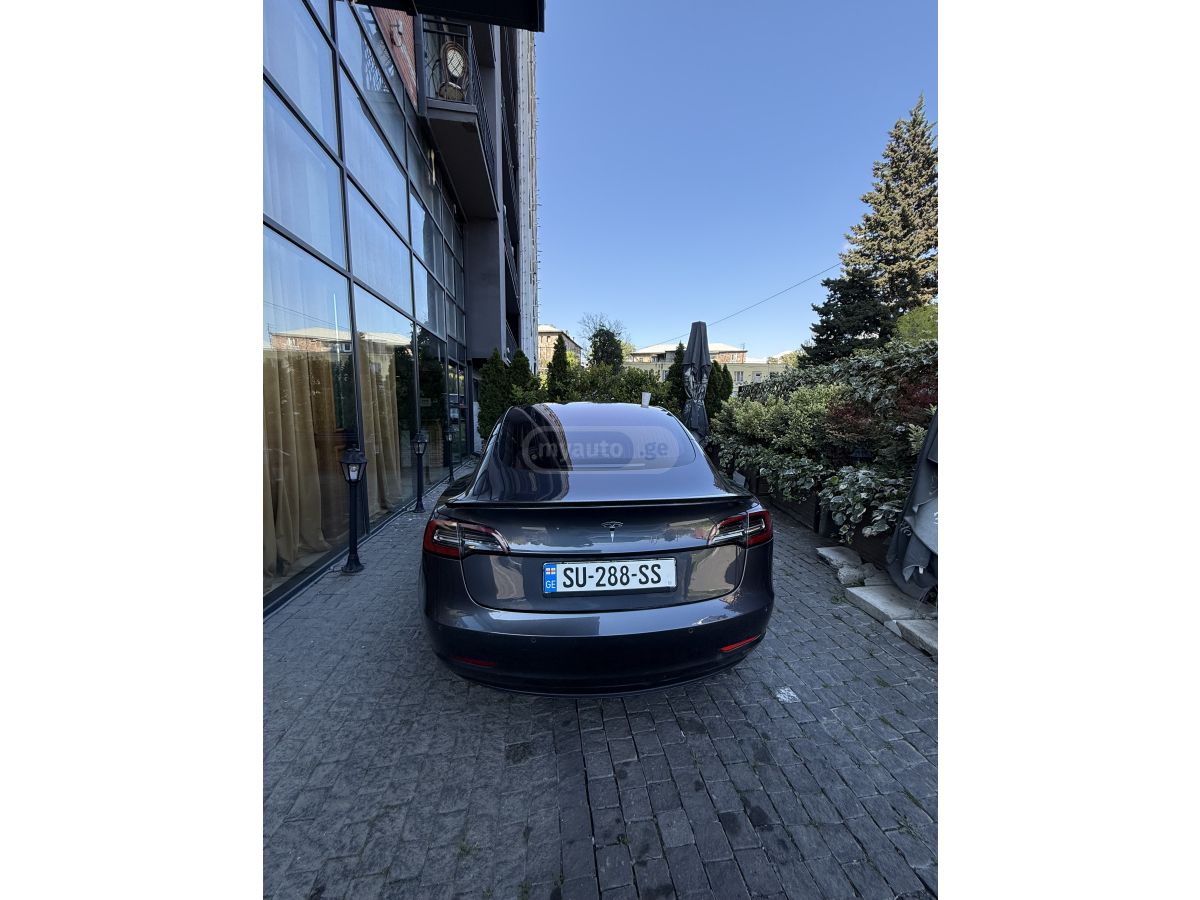 Tesla Model 3 - фото 7
