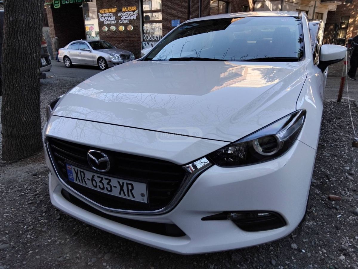 Mazda Axela - фото 5