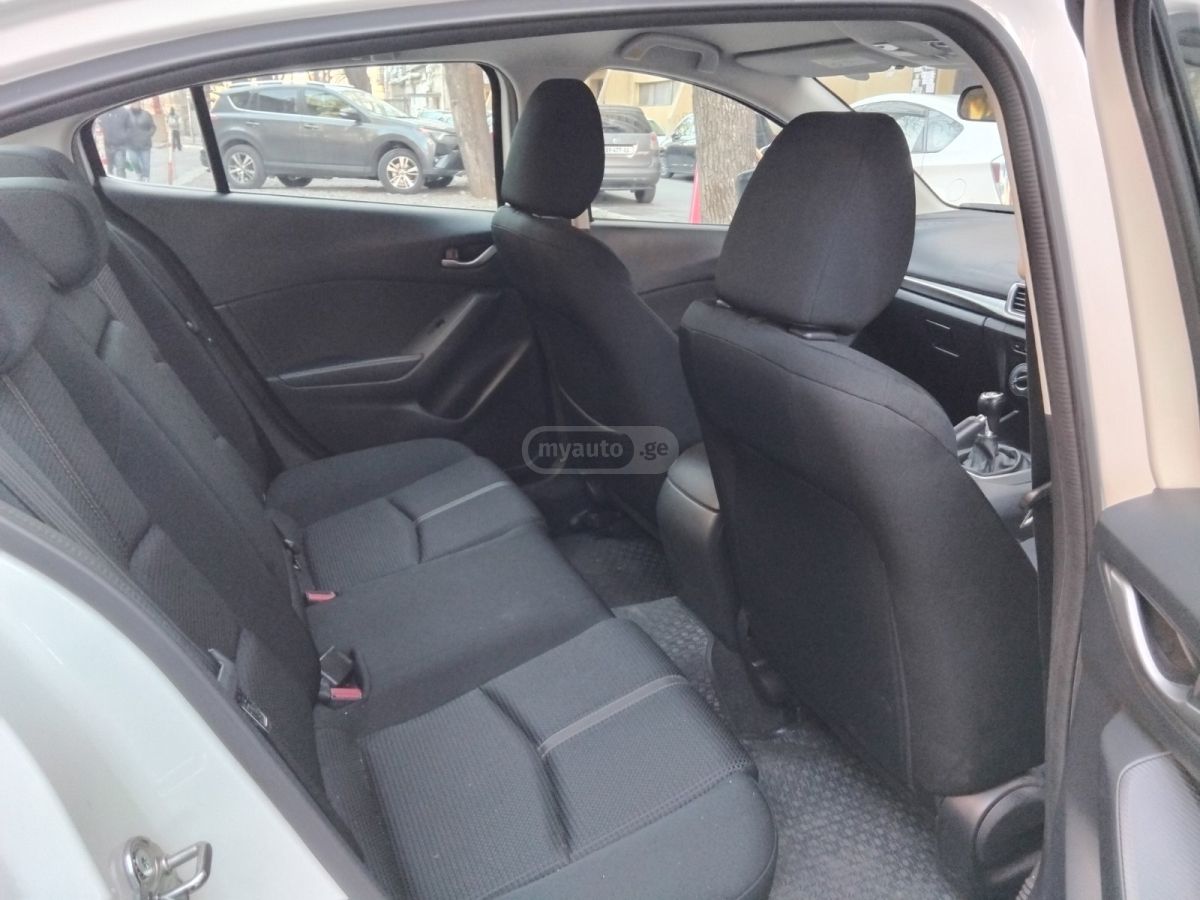 Mazda Axela - фото 6