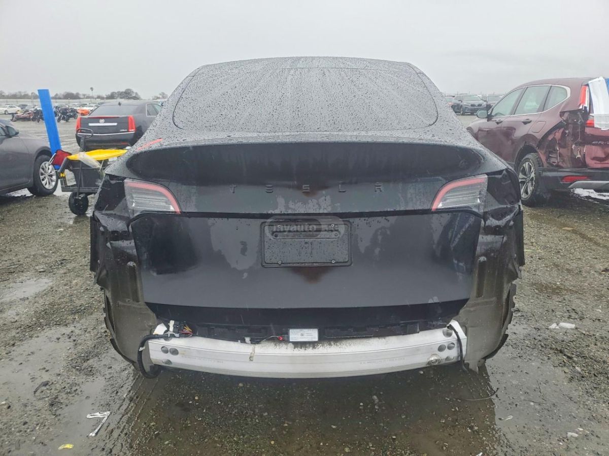 Tesla Model Y - фото 6