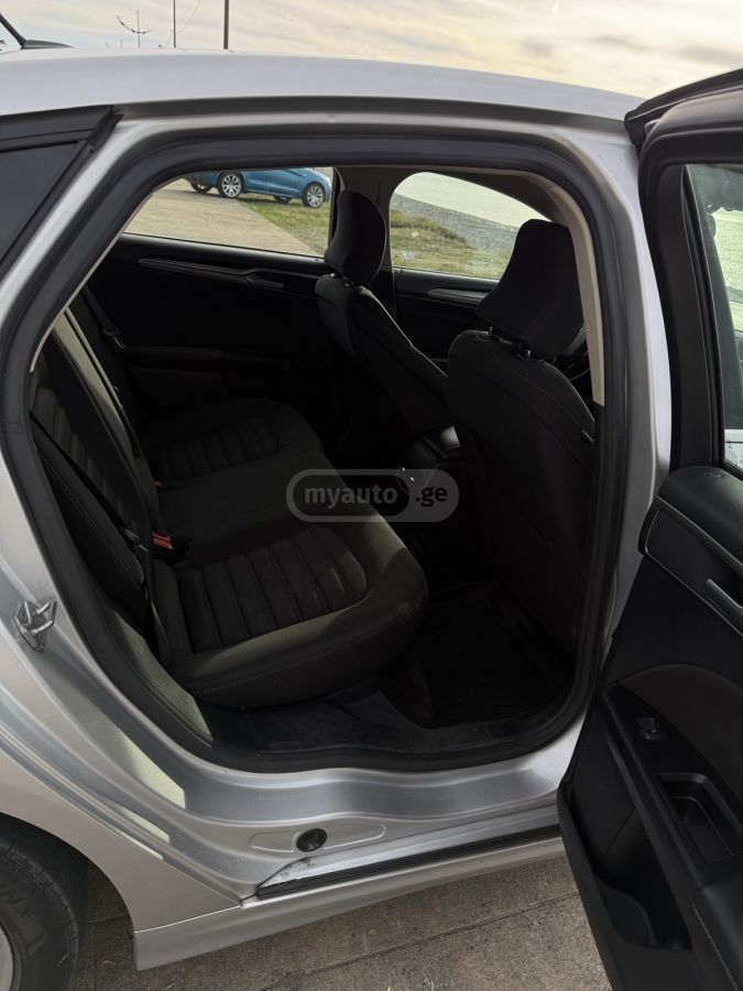 Ford Fusion - фото 11