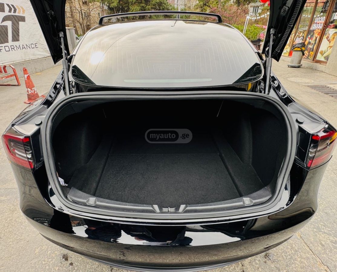 Tesla Model 3 - фото 14