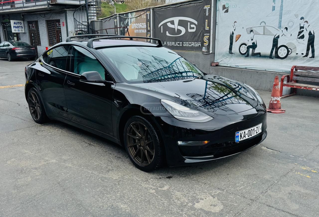 Tesla Model 3 - фото 15