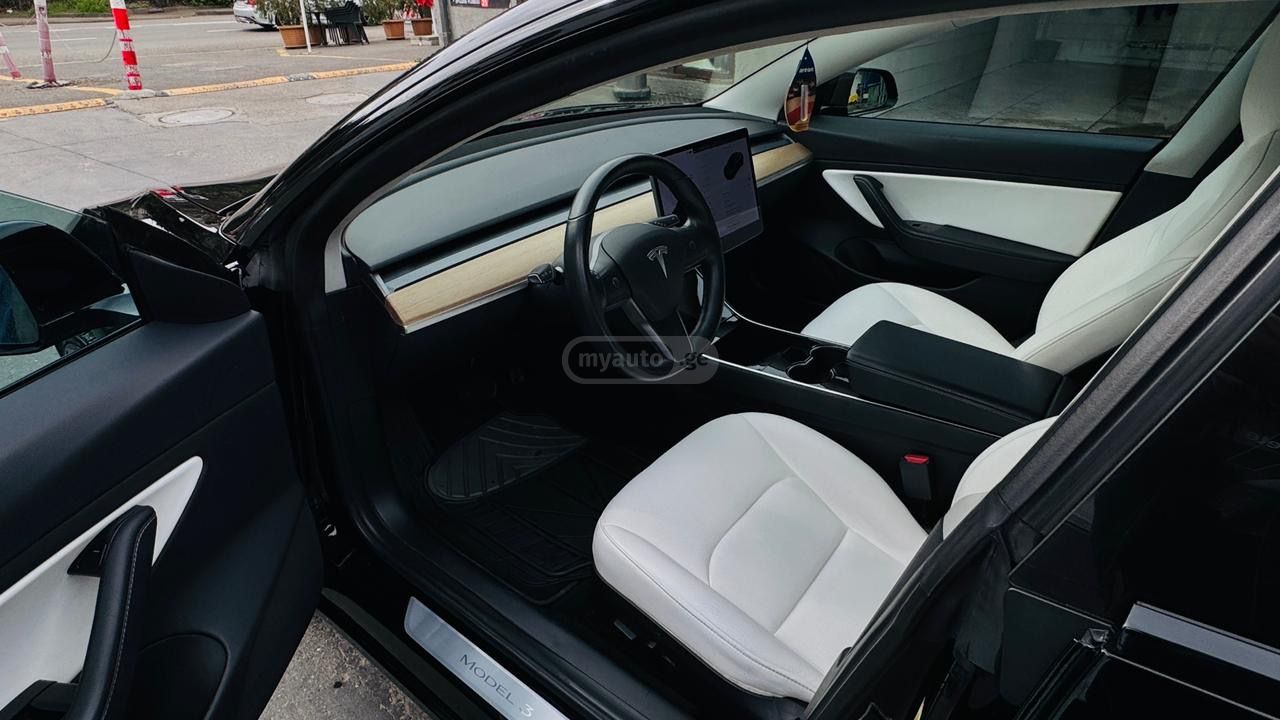 Tesla Model 3 - фото 9