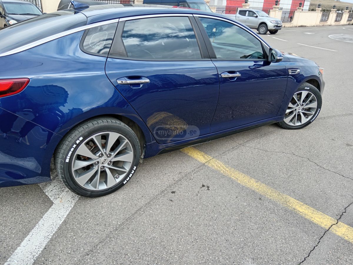 Kia Optima - фото 12