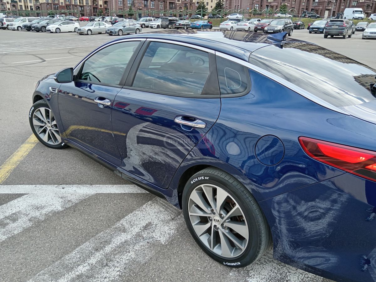 Kia Optima - фото 13
