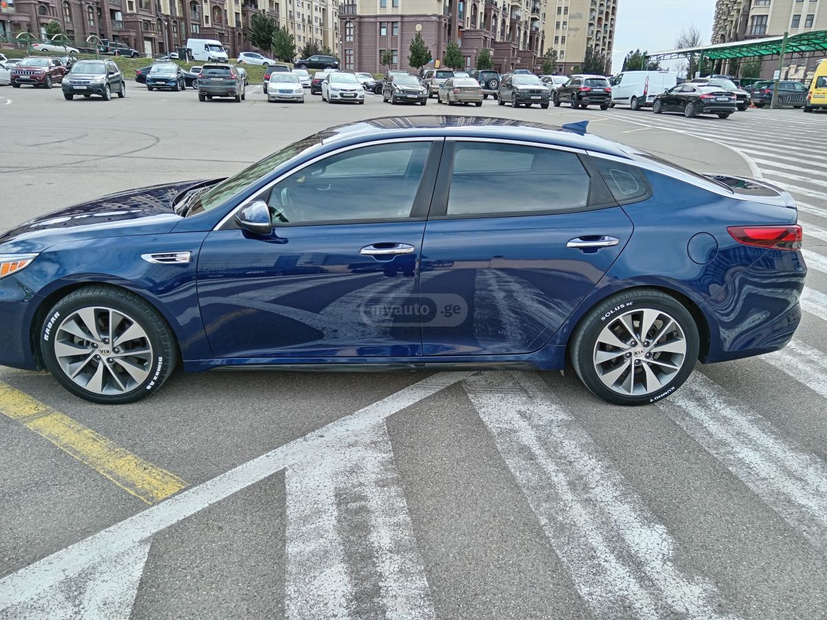 Kia Optima - фото 4