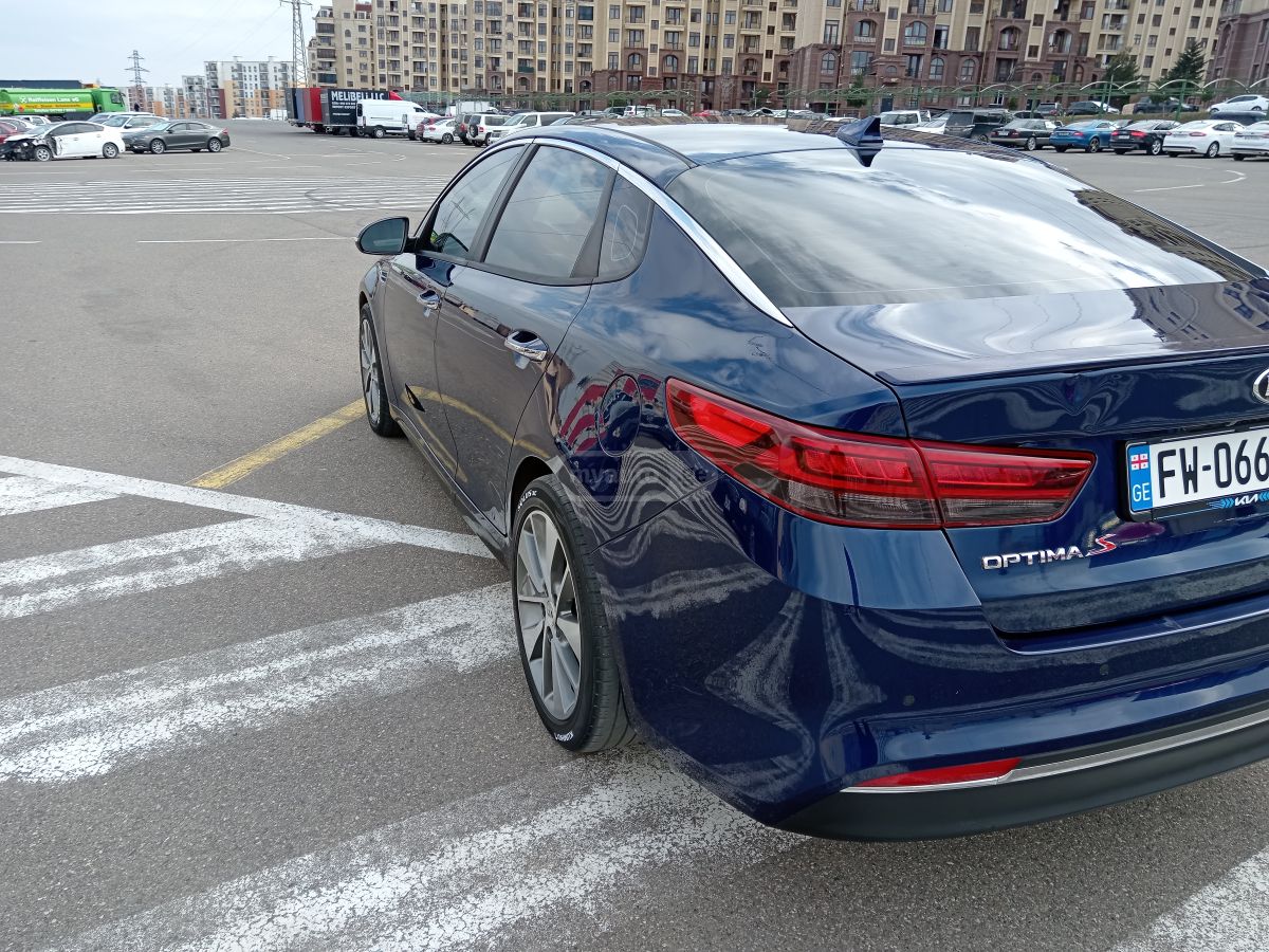 Kia Optima - фото 5