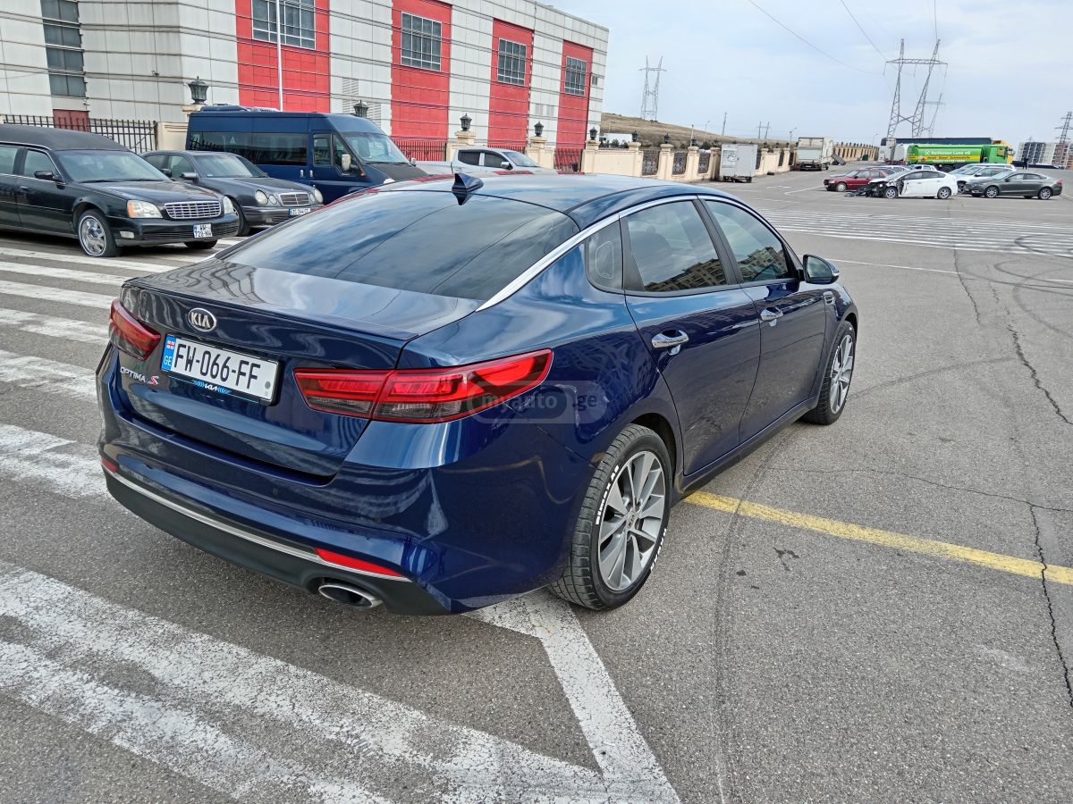 Kia Optima - фото 6