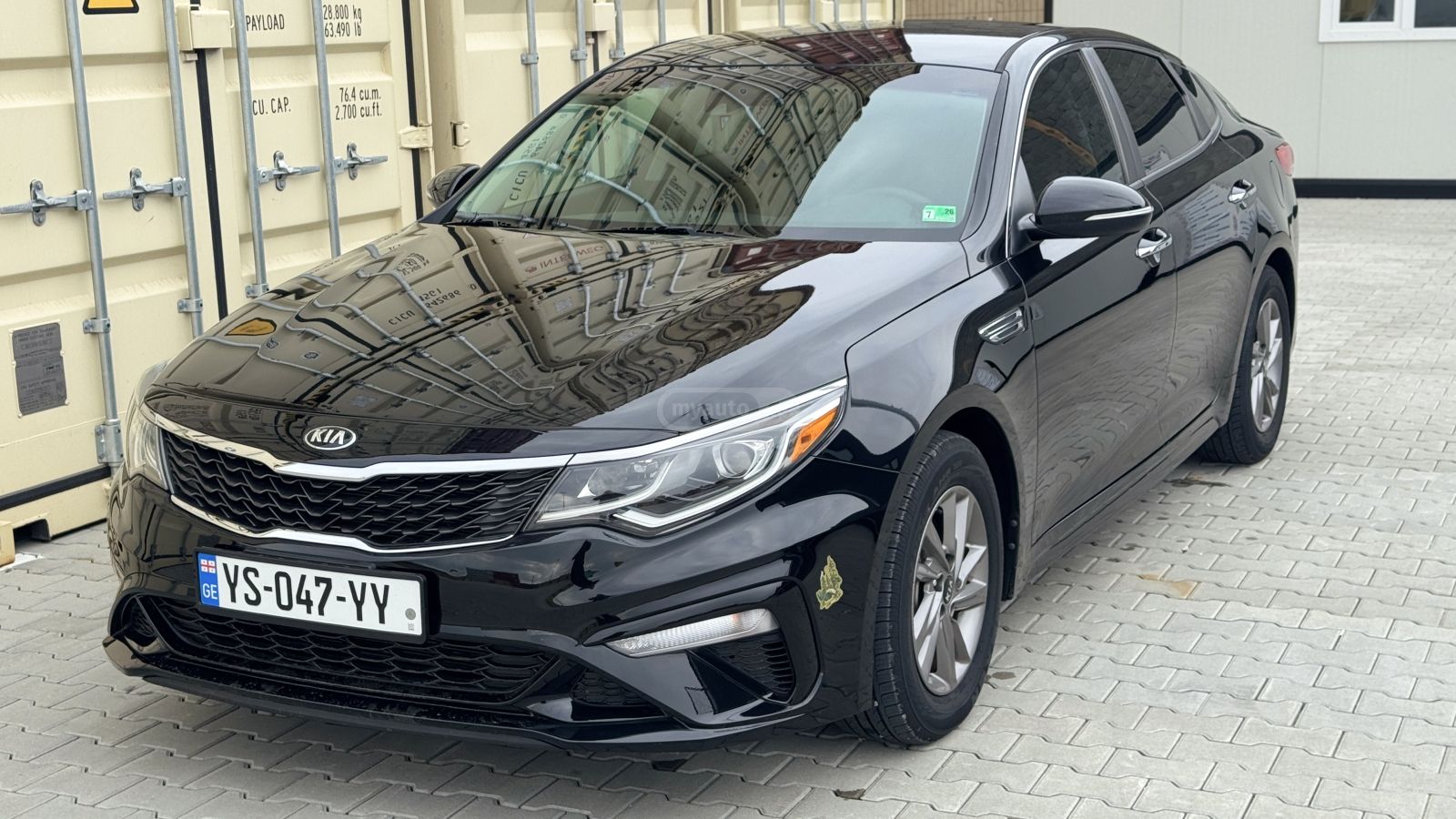 Kia Optima - фото 1